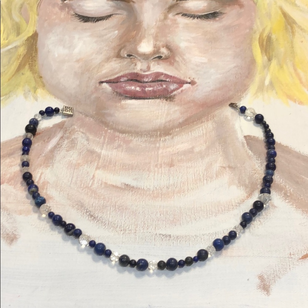 Blue bead with clear accent beads 17” long